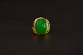 Jade is a gold ring decorated with green jade. beautiful