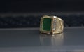 Jade is a gold ring decorated with green jade. beautiful