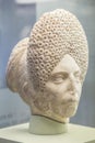 Female Roman Head with complicated curly hairstyle