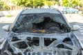 Jaffa, Tel Aviv, Israel. Burned car close up. Car after the fire, crime of vandalism, riots. Arson car. Accident on the
