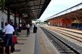 Passengers wait on platform for Colombo bound train at Jaffna Railway Station Sri Lanka Royalty Free Stock Photo