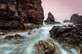 Jagged beach and rushing water