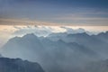 Jagged blue ridges and hazy Trenta valley Julian Alps Slovenia
