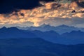 Jagged blue silhouettes and orange clouds High Tauern Austria