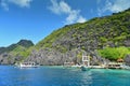 Jagged limestone cliffs of Matinloc Island at Palawan in Philippines Royalty Free Stock Photo