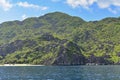 Jagged limestone cliffs of Matinloc Island at Palawan in Philippines Royalty Free Stock Photo