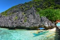 Jagged limestone cliffs of Matinloc Island at Palawan in Philippines Royalty Free Stock Photo