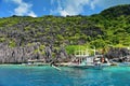 Jagged limestone cliffs of Matinloc Island in Philippines Royalty Free Stock Photo