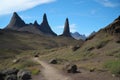 jagged mountain peaks in the distance, with trail markers leading the way Royalty Free Stock Photo