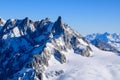 Jagged peaks above Glacier du Geant in winter sun Royalty Free Stock Photo