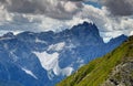 Jagged peaks of Sexten Dolomites from grassy Carnic Alps Italy Royalty Free Stock Photo