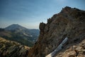 Jagged Rocks On The Summit Of Brokeoff Mountain With Lassen Peak In The Distance