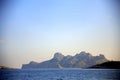 Jagged rocky wall silhouette on azure sea, at sunset, Parc National des Calanques, Marseille, France