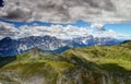 Jagged Sexten Dolomites with green slopes of Carnic Alps Italy