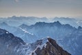 Jagged snowy ridges of Wetterstein and Karwendel in morning Royalty Free Stock Photo