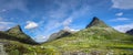 Jagged stone mountain peaks and mossy landscapes