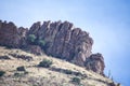 Jagged vertical rocky cliffs with exposed sedimentary rock layers at Sabino Canyon, Tucson, Arizona