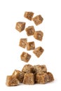 Jaggery falling on white background