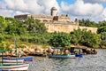 Jagua castle fortified walls with trees and fishing boats in the