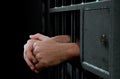 Jail Cell Door And Hands Royalty Free Stock Photo