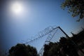 Jail fence sky sun Royalty Free Stock Photo