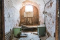 Jail interior with rusty cell.