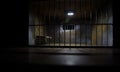 Jail or prison cell. Old grunge prison miniature. Dark prison interior creative decoration. Empty cell. Selective focus Obsolete