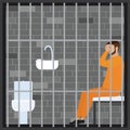 Jailed man in prison cell. Suspect, convict in Interrogation Room. Lawbreaker or offender in prison uniform Royalty Free Stock Photo