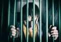 Jailed Young Man Royalty Free Stock Photo