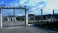 Jailhouse entrance with a guard walking by