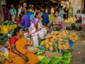 JAIPUR, INDIA - AUGUST 25 2017: Indian women sells assorted food in the streets in Jaipur, India. In India poor women