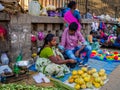 JAIPUR, INDIA - AUGUST 25 2017: Indian women sells assorted food in the streets in Jaipur, India. In India poor women