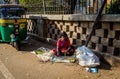 JAIPUR, INDIA - AUGUST 25 2017: Indian women sells food in the streets in Jaipur, India. In India poor women often sell