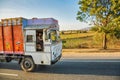 Jaipur, India - Jan 04, 2020: Happy Indian lorry driver sitting in his truck and smiling happily at Jaipur, India