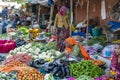 Food trader selling vegetables in the street market in holy city Jaipur, Rajasthan, India