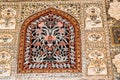 JAIPUR, INDIA - NOVEMBER 5, 2017: Floral ornament on wall in Amber Fort Royalty Free Stock Photo