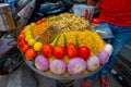 JAIPUR, INDIA - SEPTEMBER 19, 2017: Close up of assorted food, tomato, onion, noddle, chili, pepper over a plastic tray