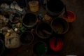 JAIPUR, INDIA - SEPTEMBER 19, 2017: Close up of a plastic pails with assorted colors of painting, used for for Textile