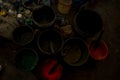 JAIPUR, INDIA - SEPTEMBER 19, 2017: Close up of a plastic pails with assorted colors of painting, used for for Textile