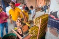 Jaipur, India - September 20, 2017: Unidentified man working with a machine to extract refreshing juice from sugar cane Royalty Free Stock Photo