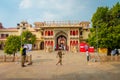 JAIPUR, INDIA - SEPTEMBER 19, 2017: Unidentified people at the entrance gate to the City Palace in Jaipur, India