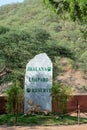 Jaipur , rajasthan / india - 9 june 2020 : Rock written with jhalana leopard reserve also in the bottom of rock mother leopard