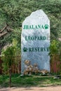 Jaipur , rajasthan / india - 9 june 2020 : Rock written with jhalana leopard reserve also in the bottom of rock mother leopard