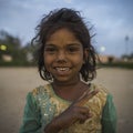 Portrait of young poor smiling girl in India Royalty Free Stock Photo