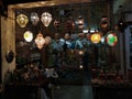 An antique shop with magical lamps of historic value. Christmas shopping during night light.