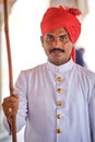 Indian man in traditional Rajasthani clothes wearing turban safa hat, Jaipur, India Royalty Free Stock Photo