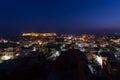 Jaisalmer cityscape at dusk. The majestic fort dominating the city. Scenic travel destination and famous tourist attraction in the