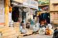 Indian old street market and cow in Jaisalmer, India Royalty Free Stock Photo