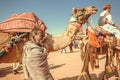 Camel rider in caravan of the outdoor Desert Festival of Rajasthan Royalty Free Stock Photo