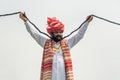 Indian man with beard and long mustache wearing traditional clothes in Desert Festival in Jaisalmer. Rajasthan. India Royalty Free Stock Photo